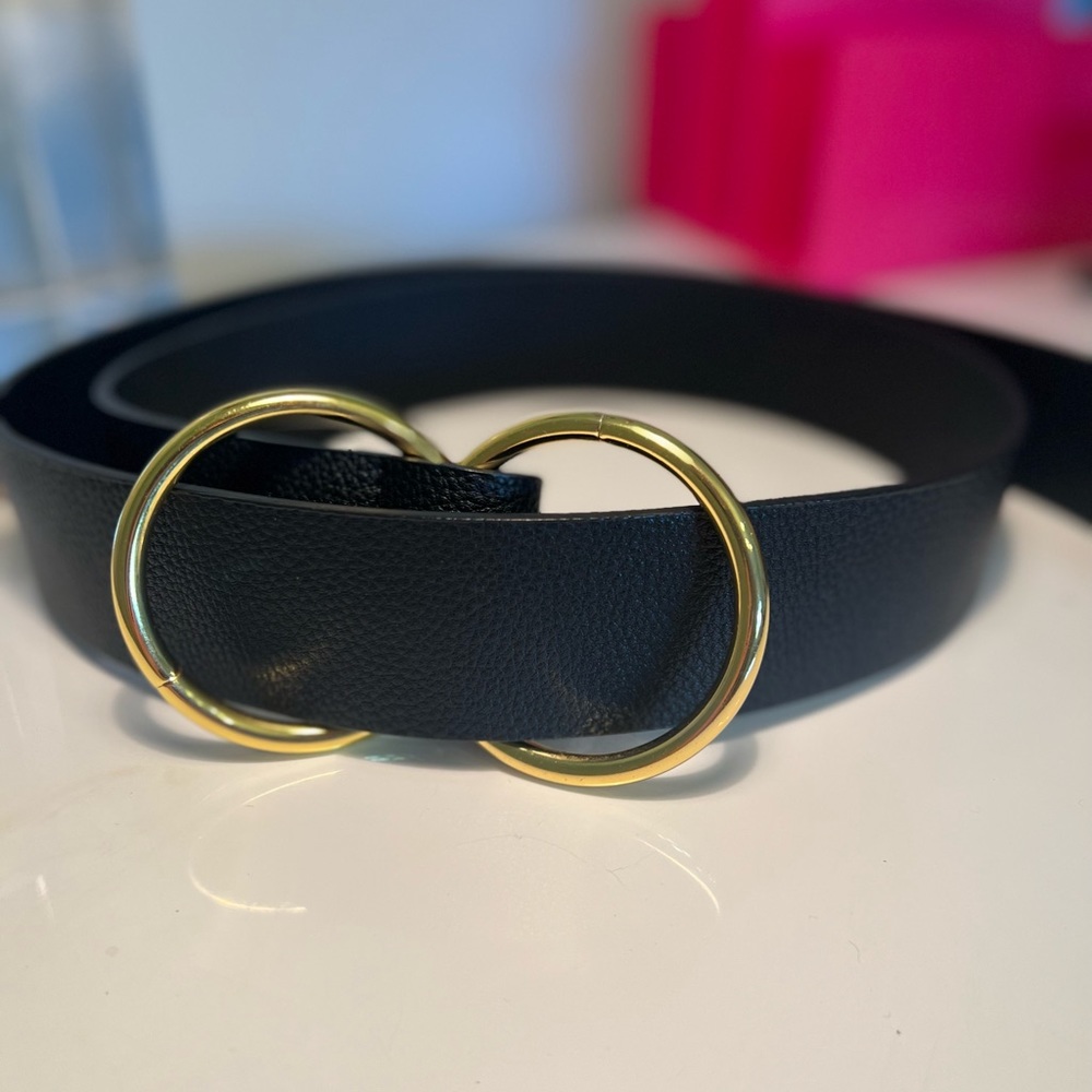 Black leather belt with gold circle buckle